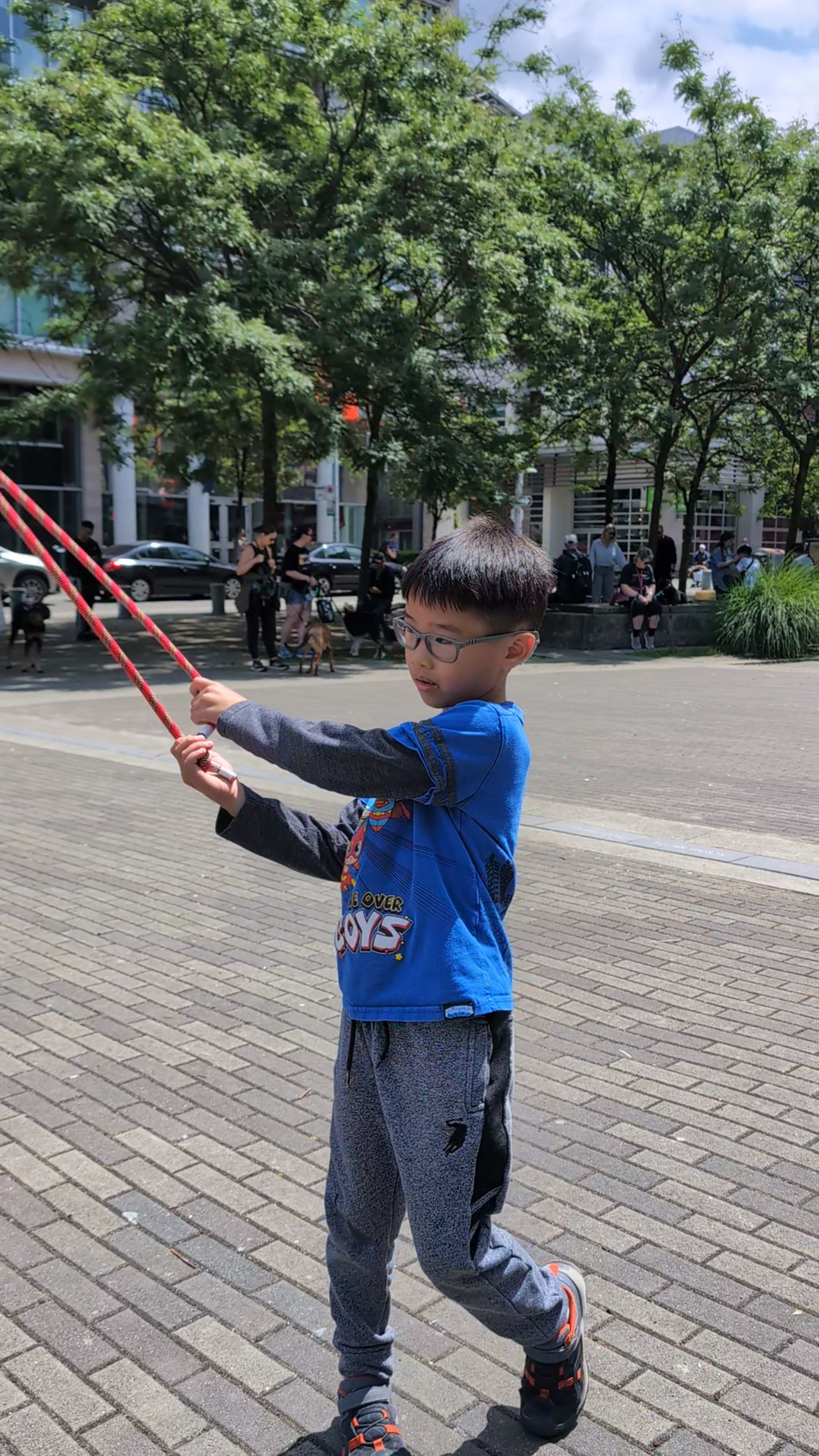 Child playing with a rope flow rope