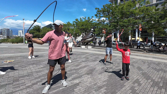 Heavy flow rope conditioning practice outdoors