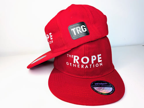 Red flat brim snap back cap with the words the rope generation