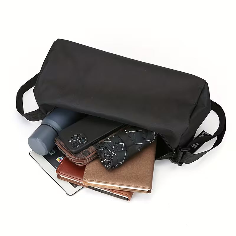 The Rope Generation Crossbody Duffle Bag with items
